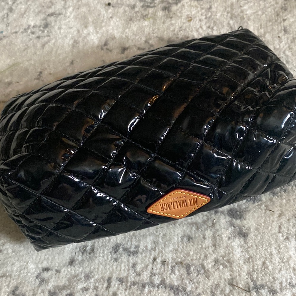 Patent leather bag. Whether used for makeup or as a clutch